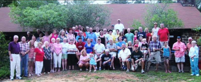 Descendants of Josh and Frankie Dunnam stand outside of the Pavilion at Clarkco State Park during a 2010 family reunion
