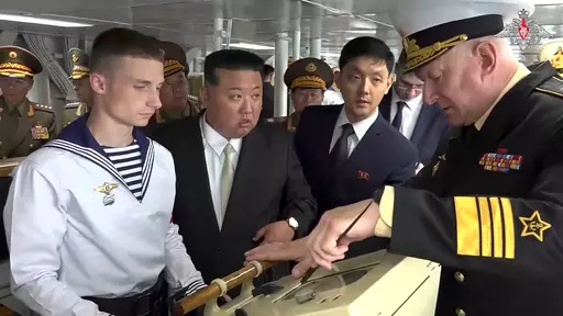 In this image taken from video released by Russian Defense Ministry Press Service on Saturday, Sept. 16, 2023, North Korea's leader Kim Jong Un, center, listens explanations by Admiral Nikolai Yevmenov, Commander-in-Chief of the Russian Navy, right, while visiting the Admiral Shaposhnikov frigate of the Russian navy in the port of Vladivostok, Russian Far East. North Korean leader Kim inspected Russia's nuclear-capable bombers and a warship in its Pacific fleet on Saturday as he continued a trip