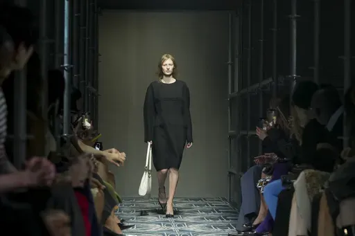 A model wears a creation as part of the Prada Fall/Winter 2025-2026 Womenswear collection presented in Milan, Italy, Thursday, Feb. 27, 2025. (AP Photo/Antonio Calanni)