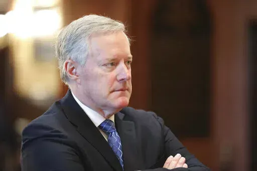 Former White House Chief of Staff Mark Meadows listens during an announcement of the creation of a new South Carolina Freedom Caucus based on a similar national group at a news conference on April 20, 2022 in Columbia, S.C. Meadows accused the congressional committee investigating last year's attack on the U.S. Capitol of leaking all of the text messages he provided to the panel in what he says was an effort to vilify him publicly. (AP Photo/Jeffrey Collins, File)