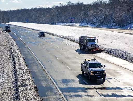 Snow plows pushes snow to the side of northbound Interstate 95 in Spotsylvania County, Va., on Tuesday, Jan. 4, 2022. Hundreds of motorists were stranded on Monday, after a winter storm snarled traffic in Virginia and left some drivers stuck in place for nearly 24 hours in freezing temperatures along an impassable stretch of Interstate 80 south of the nation's capital. (Tristan Lorei