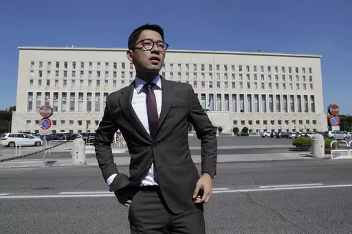 Hong Kong activist Nathan Law takes part in a protest during a meeting of Chinese Foreign Minister Wang Yi with Italian Foreign Minister Luigi Di Maio, in Rome, Tuesday, Aug. 25, 2020. Hong Kong police on Monday, July 3, 2023, accused eight self-exiled pro-democracy activists, including Nathan Law, of violating the territory's tough National Security Law and offered rewards of 1 million Hong Kong dollars ($127,600) each for information leading to their arrests. (AP Photo/Andrew Medichini, File)