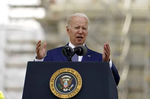 President Joe Biden speaks at the National Peace Officers' Memorial Service on the West Front of the Capitol in Washington, Sunday, May 15, 2022, honoring the law enforcement officers who lost their lives in the line of duty in 2021. (AP Photo/Manuel Balce Ceneta)