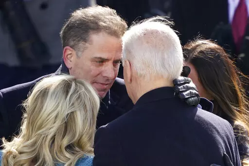 President Joe Biden hugs first lady Jill Biden, his son Hunter Biden and daughter Ashley Biden after being sworn-in during the 59th Presidential Inauguration at the U.S. Capitol in Washington, Jan. 20, 2021. A federal grand jury has heard testimony in recent months about Hunter Biden’s income and payments he received while serving on the board of an Ukraine energy company. That's according to two people familiar with the probe. (AP Photo/Carolyn Kaster, File)