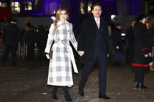 Britain's Britain's Princess Beatrice and Edoardo Mapelli Mozzi attend the Together At Christmas carol service at Westminster Abbey, in London, Dec. 15, 2022. (Henry Nicholls/Pool Photo via AP, File)