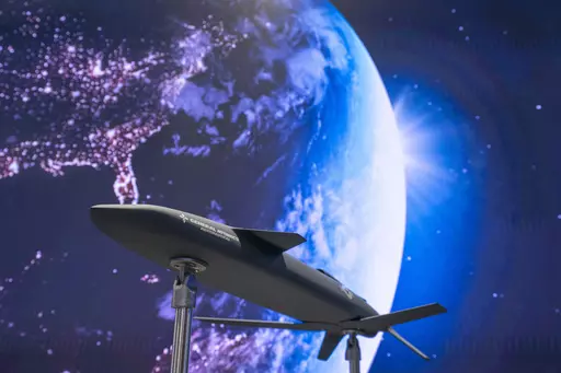 The Longshot, an air-launched unmanned aircraft that General Atomics is developing with the Defense Advanced Research Project Agency for use in tandem with piloted Air Force jets, is displayed at the Air & Space Forces Association Air, Space & Cyber Conference, Wednesday, Sept. 13, 2023 in Oxon Hill, Md. Pentagon planners envision using such drones in "human-machine teaming" to overwhelm an adversary. But to be fielded, developers will need to prove the AI tech is reliable and trustworthy enough