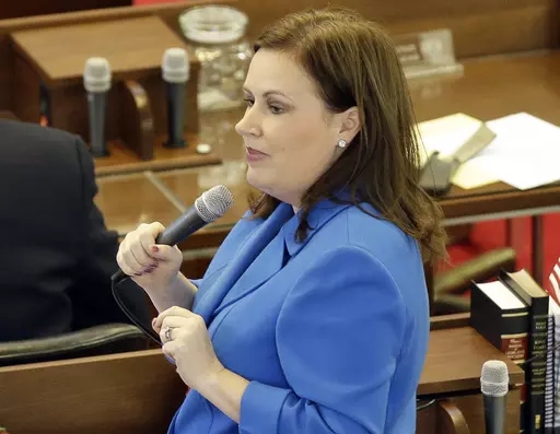 State Rep. Tricia Cotham, D-Mecklenburg, speaks on the House floor as North Carolina lawmakers gather for a special session on March 23, 2016, in Raleigh, N.C. Speculation is brewing in North Carolina that Cotham may change her party affiliation. Republicans have scheduled a news conference Wednesday, April 5, 2023, with Cotham, of Mecklenburg County. If Cotham does switch parties, the move would give the GOP complete veto-proof control of the General Assembly and hand Democratic Gov. Roy Cooper
