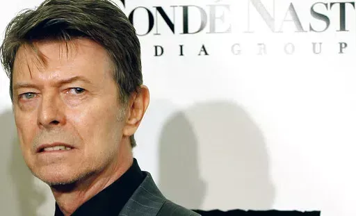 David Bowie arrives at the Fourth Annual Black Ball Concert for "Keep A Child Alive" on Oct. 25, 2007, in New York.  Warner Chappell Music has purchased the global music publishing rights to David Bowie’s song catalog. The deal includes hundreds of songs such as “Space Oddity,” “Ziggy Stardust,” “Fame,” “Modern Love” and “Let’s Dance.”  (AP Photo/Stephen Chernin, File)