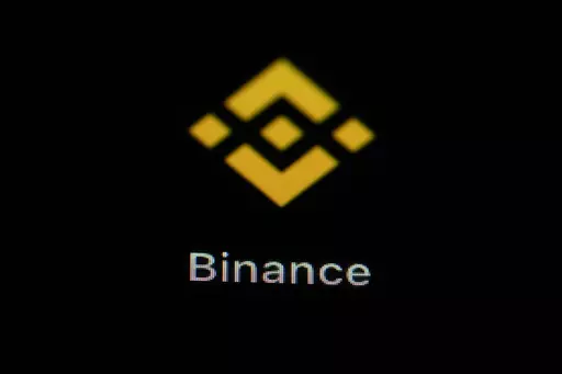 The Binance app icon is seen on a smartphone, Feb. 28, 2023, in Marple Township, Pa. The U.S. Securities and Exchange Commission and Binance have reached an agreement in court, Saturday, June 17, that lets the world's largest cryptocurrency exchange continue to operate in the United States as it battles SEC fraud charges. (AP Photo/Matt Slocum, File)