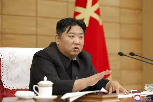 In this photo provided by the North Korean government, North Korean leader Kim Jong Un attend a a ruling party politburo meeting in Pyongyang, North Korea Saturday, May 21, 2022. Independent journalists were not given access to cover the event depicted in this image distributed by the North Korean government. The content of this image is as provided and cannot be independently verified. Korean language watermark on image as provided by source reads: "KCNA" which is the abbreviation for Korean Ce