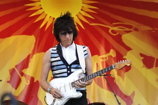 Rocker Jeff Beck performs at the Louisiana Jazz and Heritage Festival in New Orleans, Friday, April 29, 2011. (AP Photo/Gerald Herbert)