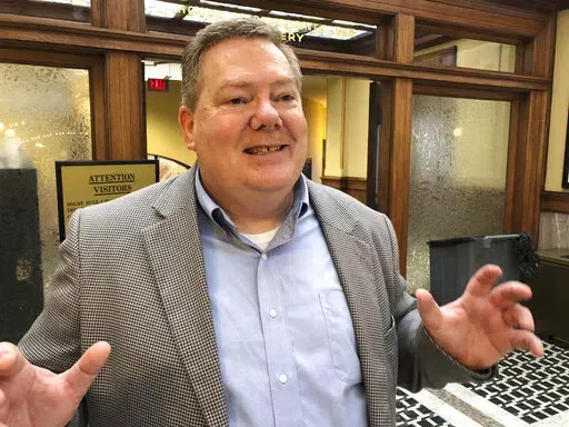 Sean Milner, executive director of The Baptist Children's Village, speaks about his support for Mississippi to create a tuition waiver program for young people who have been in foster care, on Thursday, Feb. 3, 2022, at the Mississippi State Capitol in Jackson. (AP Photo/Emily Wagster Pettus)