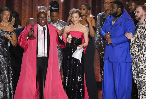 Michael R. Jackson, second left, accepts the award for best new musical for "A Strange Loop" at the 75th annual Tony Awards on Sunday, June 12, 2022, at Radio City Music Hall in New York. (Photo by Charles Sykes/Invision/AP)