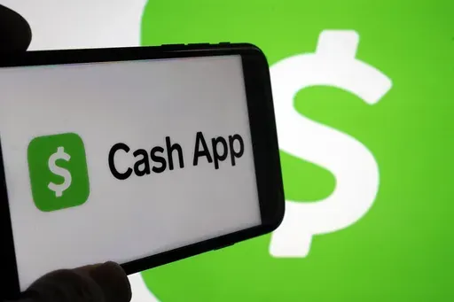 Cash App logos are seen on a phone screen, Sept. 8, 2023, in New York. (AP Photo/Richard Drew, File)