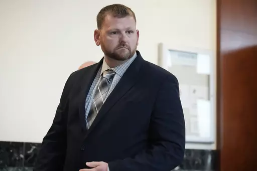 Former Aurora, Colo., Police Department officer Randy Roedema leaves the courtroom after he was convicted of charges in the 2019 death of Elijah McClain after a trial in the Adams County, Colo., courthouse Thursday, Oct. 12, 2023, in Brighton, Colo. (AP Photo/David Zalubowski)