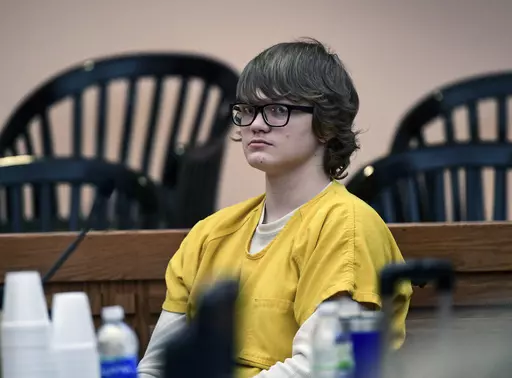 Jesse Osborne waits for a ruling at the Anderson County Courthouse, Feb. 16, 2018, in Anderson, S.C.. Osborne, a school shooter serving a life sentence without parole for killing a first grader on a South Carolina playground when he was 14 is asking a judge to lessen his sentence so he can eventually get out of prison. On Monday, May 22, 2023, Osborne's lawyer asked Judge Lawton McIntosh to reconsider his sentence so Osborne, now 21, could have some hope of freedom in his late 50s or even 60s. (