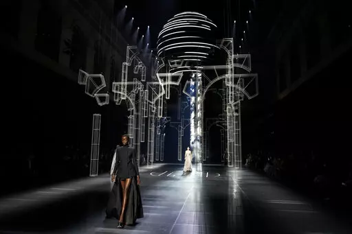 A model wears a creation for the Fendi Spring-Summer 2022 Haute Couture fashion collection, in Paris, Thursday, Jan. 27, 2022. (AP Photo/Thibault Camus)