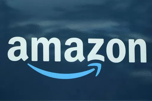 An Amazon logo appears on a delivery van, Oct. 1, 2020, in Boston. Amazon plans to eliminate 9,000 more jobs in the next few weeks, the company's CEO Andy Jassy said in a memo to staff on Monday, March 20, 2023. The job cuts would mark the second largest round of layoffs in the company's history, adding to the 18,000 employees the company said it would lay off in January. (AP Photo/Steven Senne, File)