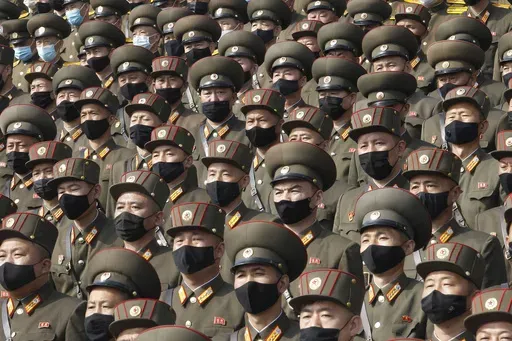 Soldiers wearing face masks to help curb the spread of the coronavirus rally to welcome the 8th Congress of the Workers' Party of Korea at Kim Il Sung Square in Pyongyang, North Korea, on Oct. 12, 2020. (AP Photo/Jon Chol Jin, File)