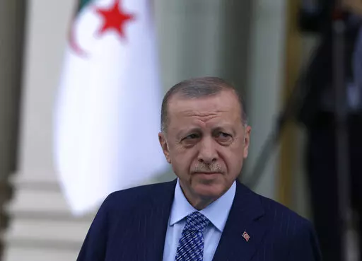 Turkish President Recep Tayyip Erdogan arrives for a ceremony, in Ankara, Turkey, on May 16, 2022. Even by the standards of Turkey's and Greece's frequently strained relations, it was a remarkable escalation. Turkey's president Recep Tayyip Erdogan directly threatened his country's western neighbor: Unless the Greeks "stay calm," he said, Turkey's new ballistic missiles would hit their capital city. The striking rhetoric has led many to question the reasons behind it, and whether it could be a h