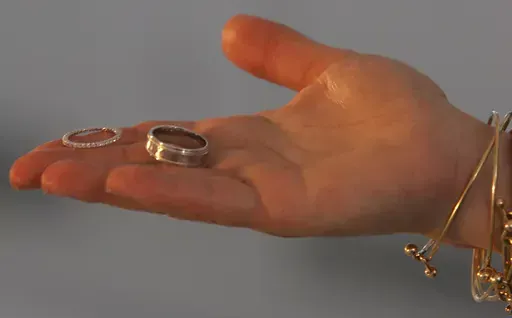 A marriage official offers a couple their rings during their wedding at the Empire State Building in New York, Wednesday Feb. 14, 2007. Cheating on your spouse is illegal in New York — but the state might soon change that. A bill working its way through the New York Legislature could repeal a more than century old law that makes adultery a crime. (AP Photos/Bebeto Matthews, File)