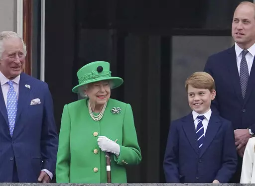 From left, Prince Charles, Queen Elizabeth II, Prince George and Prince William appear on the balcony of Buckingham Palace during the Platinum Jubilee Pageant outside Buckingham Palace in London, Sunday June 5, 2022.  After four days of parades, street parties and a gala concert celebrating Queen Elizabeth II's 70 years on the throne, the Platinum Jubilee ended Sunday with the crowd outside Buckingham Palace singing "God Save the Queen." But as the tributes to the queen's lifetime of service be