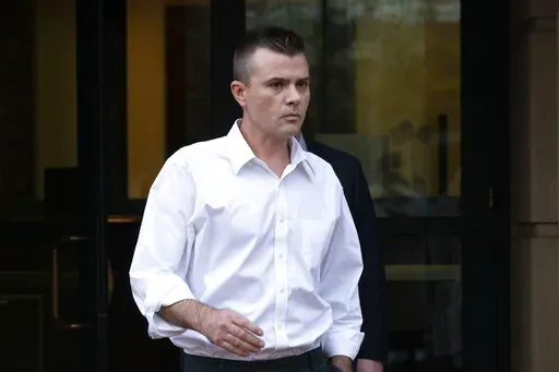 Igor Danchenko, a think tank analyst accused of lying to the FBI about his role in the creation of a discredited dossier about former President Donald Trump, leaves Albert V. Bryan United States Courthouse in Alexandria, Va., on Nov. 4, 2021. A jury on Tuesday, Oct. 18, 2022, acquitted  Danchenko on all counts. (AP Photo/Manuel Balce Ceneta, File)