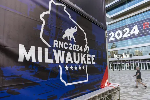 People walk past the Fiserv Forum ahead of the 2024 Republican National Convention, Thursday, July 11, 2024, in Milwaukee. The convention ended Friday, July 19, and was projected to bring in millions of economic impact dollars to Milwaukee. (AP Photo/Alex Brandon, File)