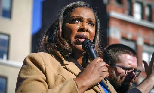 New York Attorney General Letitia James speaks during a rally in support of home care workers in New York, Tuesday, Dec. 14, 2021. Former President Donald Trump recently told a mostly white crowd at a rally in Texas that his legal troubles are the fault of Black prosecutors he called racists. Trump repeated his charges of racism  to underscore his contention that he couldn’t possibly be treated fairly by Black officials who are leading Trump investigations in New York and Georgia. (AP Photo/S