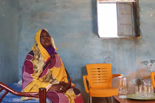 Raqiya Abdsalam, who survived a bout of dengue fever, sits at her home in El-Obeid, Sudan on January 23, 2023. A surge in mosquito-borne diseases this winter has shown the fragility of Sudan's health system, and bodes ill for coming challenges, especially after a 2021 military coup. (AP Photo/Marwan Ali)