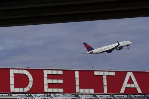 A Delta Air Lines plane takes off from Hartsfield-Jackson Atlanta International Airport in Atlanta, Nov. 22, 2022. Delta announced Thursday, Jan. 5, 2023, that it will provide free Wi-Fi service on most of its U.S. flights starting in February. (AP Photo/Brynn Anderson, File)