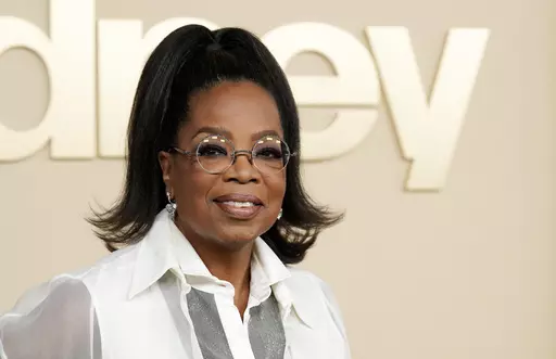 Oprah Winfrey, a producer of the documentary "Sidney," about actor Sidney Poitier, appears at the premiere on Sept. 21, 2022 in Los Angeles. Winfrey announced that she had chosen Ann Napolitano’s book "Hello Beautiful" for her 100th book club pick. (AP Photo/Chris Pizzello, File)