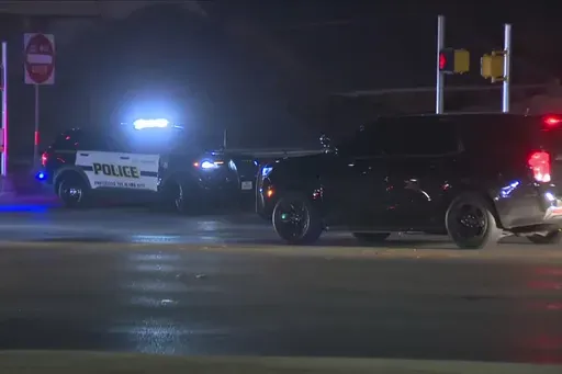 This image made from video provided by KSAT shows law enforcement vehicles after multiple San Antonio, Texas, police officers were shot in San Antonio, Wednesday, Jan. 22, 2025. (KSAT via AP)