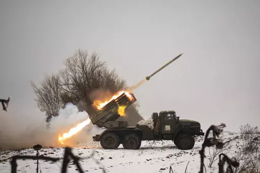 Ukrainian military fires from a multiple rocket launcher at Russian positions in the Kharkiv area, Ukraine, Saturday, Feb. 25, 2023. The Biden administration declared its Ukraine solidarity with fresh action as well as strong words on Friday, piling sweeping new sanctions on Moscow and approving a new $2 billion weapons package to re-arm Kyiv a year after Russia's invasion. (AP Photo/Vadim Ghirda)