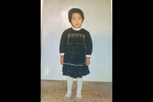 This undated photo provided by Joo-Rei Mathieson shows herself when she was in childhood taken in South Korea. A Brothers Home intake document describes Mathieson as a lost street kid brought in by police. It notes, chillingly for a government-sponsored vagrants' facility that survivors have told The Associated Press often worked children to death, that she's "capable of labor." She spoke no words for days, the document says, after entering Brothers, a now-destroyed facility in the southern port
