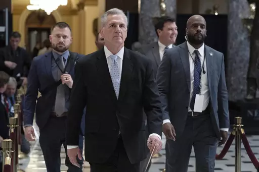 Speaker of the House Kevin McCarthy, R-Calif., walks inside the Capitol in Washington, Thursday, April 27, 2023. House Republicans have narrowly passed a sweeping debt ceiling package as they try to push President Biden into negotiations on federal spending. (AP Photo/Jose Luis Magana)