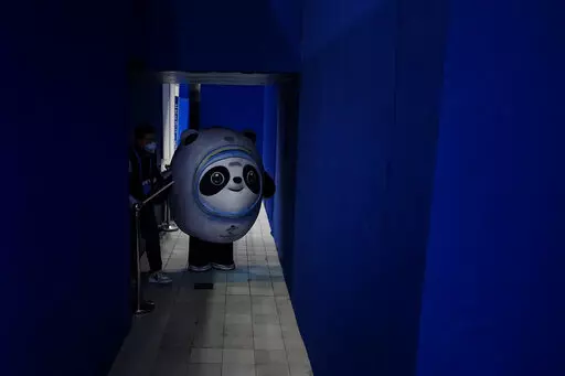 Bing Dwen Dwen, the Olympics mascot walks at the curling venue ahead of the Beijing Winter Olympics, Feb. 2, 2022, in Beijing. (AP Photo/Brynn Anderson)