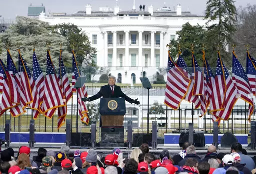 With the White House in the background, President Donald Trump speaks at a rally in Washington, Jan. 6, 2021. The January 6 committee investigation of the aftermath of the 2020 presidential election and the events leading up to the capitol insurrection raise questions about former President Donald Trump's role and whether he committed crimes. As illuminating have been the various schemes and talking points that have come up from witnesses that highlight what a president has the authority to do. 