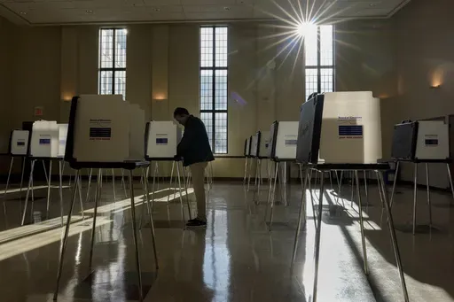 A voter fills out their Ohio primary election ballot at a polling location in Knox Presbyterian Church in Cincinnati, Ohio, on Tuesday, March 19, 2024. (AP Photo/Carolyn Kaster, File)