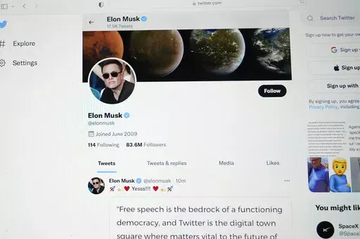 The Twitter page of Elon Musk is seen on the screen of a computer in Sausalito, Calif., on Monday, April 25, 2022.  Elon Musk wants to change how Twitter doles out its checkmark badges for verified accounts. While the “blue check” is at times viewed as an elite status symbol for the rich and famous, its purpose has always been to ensure that the people and accounts tweeting are who they say they are. (AP Photo/Eric Risberg, File)
