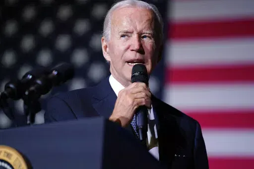 President Joe Biden speaks about student loan debt relief at Delaware State University, Friday, Oct. 21, 2022, in Dover, Del. A U.S. judge in Texas on Thursday, Nov. 9, 2022, blocked Biden's plan to provide millions of borrowers with up to $20,000 apiece in federal student-loan forgiveness. (AP Photo/Evan Vucci)