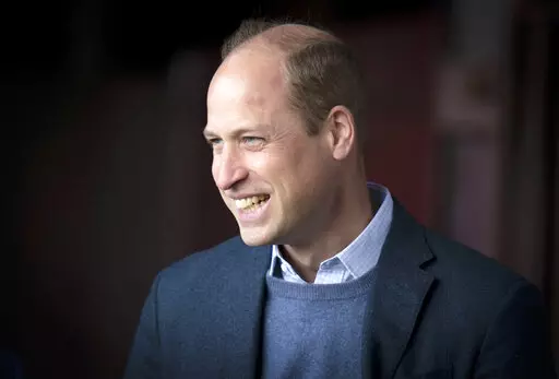 Britain's Prince William visits at the Heart of Midlothian Football Club, in Edinburgh, Scotland, Thursday May 12, 2022. The world watched as Prince William grew from a towheaded schoolboy to a dashing air-sea rescue pilot to a father of three. But as he turns 40 on Tuesday, June 21, 2022, William is making the biggest change yet: assuming an increasingly central role in the royal family as he prepares for his eventual accession to the throne. (Jane Barlow/Pool Photo via AP, File)