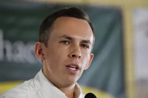 Shad White, Republican state auditor for Mississippi, addresses the crowd at the pavilion in Founders Square at the Neshoba County Fair in Philadelphia, Miss., July 28, 2022. White announced Monday, Jan. 9, 2023, that he is seeking reelection. (AP Photo/Rogelio V. Solis, File)