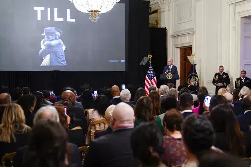 President Joe Biden speaks before the screening of the movie "Till" in the East Room of the White House in Washington, Thursday, Feb. 16, 2023. The movie, "Till," is the story of Mamie Till-Mobley who pursued justice after the lynching of her 14-year-old son, Emmett Till, in 1955. (AP Photo/Susan Walsh)