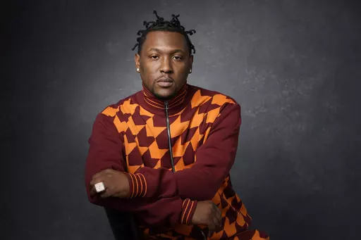 Record producer and recording artist Hit-Boy poses for a portrait, Tuesday, March 8, 2022, in Los Angeles. When Hit-Boy walks the Grammy red carpet, he expects to proudly strut into the Feb. 4, 2024 awards ceremony with his father beside him for the first time. (AP Photo/Chris Pizzello, File)