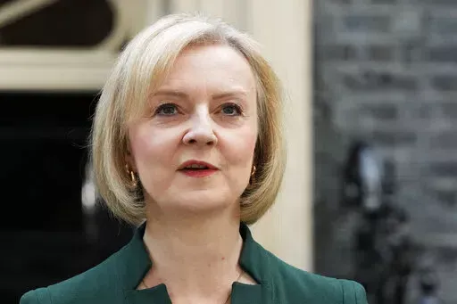 Outgoing British Prime Minister Liz Truss speaks outside Downing Street in London, on Oct. 25, 2022. Writing in the Sunday Telegraph newspaper on Sunday, Feb. 5, 2023, Truss says it wasn’t her fault. Truss alleges that a “powerful economic establishment” and opponents inside the governing Conservative Party thwarted her plans for a tax-cutting overhaul of the U.K. economy. (AP Photo/Frank Augstein, File)