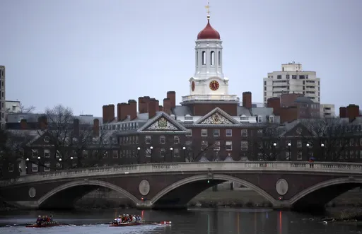 Rowers paddle down the Charles River near the campus of Harvard University in Cambridge, Mass., March 7, 2017. (AP Photo/Charles Krupa, File)