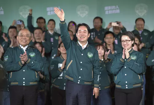 Taiwanese Vice President Lai Ching-te, also known as William Lai, center, celebrates his victory with running mate Bi-khim Hsiao, right, and supporters in Taipei, Taiwan on Jan. 13, 2024. Taiwan's incoming president is promising more of the same. The question is what that will bring, not only for Taiwan but also for its relations with China, the United States and others with an interest in the island of 23 million people that supplies many of the advanced semiconductors that keep the world runni