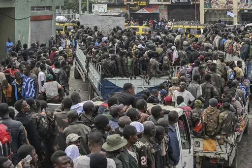M23 rebels escort government soldiers and police who surrendered to an undisclosed location in Goma, Democratic republic of the Congo, Thursday, Jan. 30, 2025.(AP Photo/Moses Sawasawa, File)