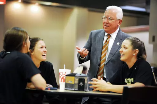 In this May 6, 2015, photo, Joe Paul, then vice president for student affairs at the University of Southern Mississippi, talks with students on campus in Hattiesburg, Miss. On Monday, Oct. 24, 2022, Paul was named president of the university.  (Eli Baylis/Hattiesburg American via AP)